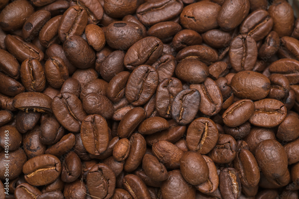 Naklejka premium roasted coffee beans, can be used as a background