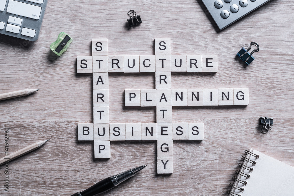Conceptual business keywords on table with elements of game maki Conceptual business keywords on table with elements of game maki