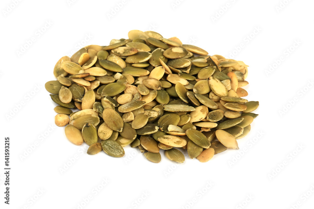 Peeled pumpkin seeds isolated on white background Peeled pumpkin seeds isolated on white background