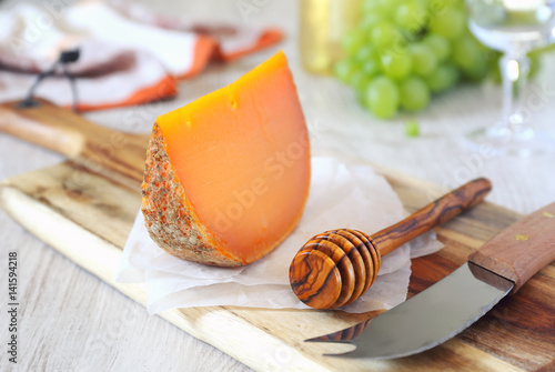 Mimolette cheese and green grapes