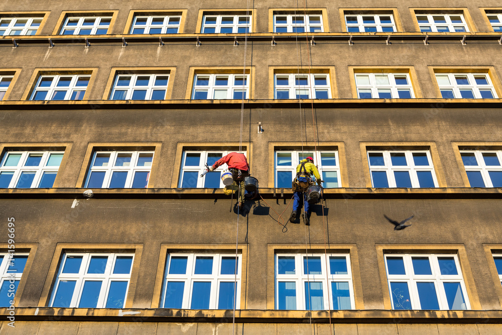 Fototapeta premium Work at height for the restoration of facade in Cracow. Poland