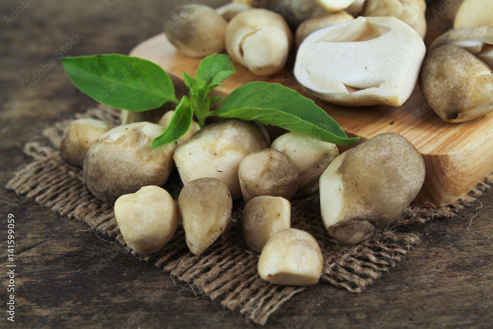 Sliced straw mushroom isolated on white background