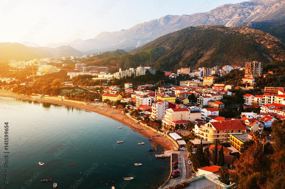 Montenegro at sunset. Aerial view of coastal town Rafailovici