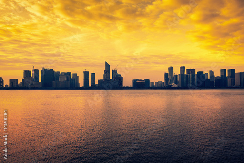 Silhouttle of cityscape along riverside.