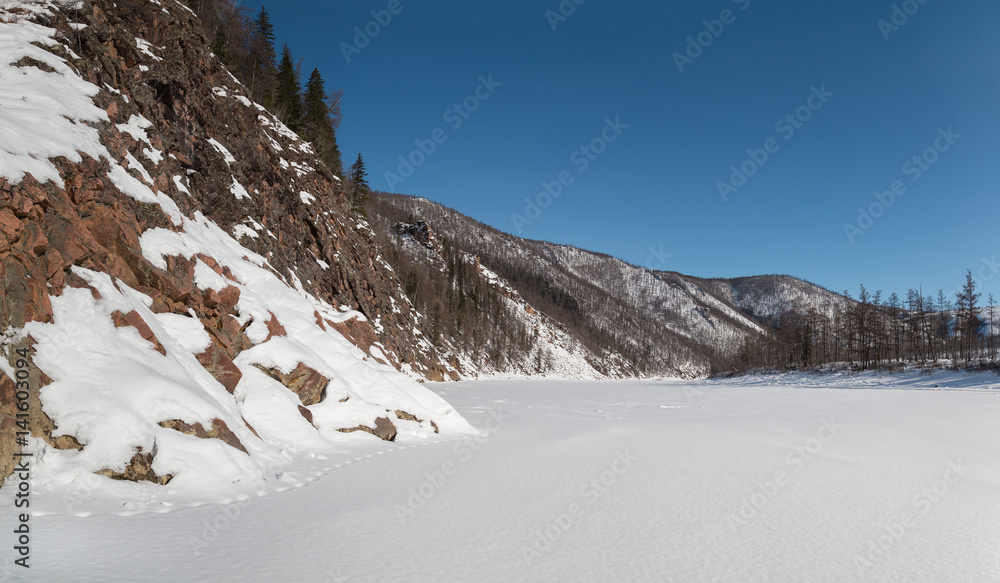 Timpton River in South Yakutia, Russia in wintertime Timpton River in South Yakutia, Russia in wintertime