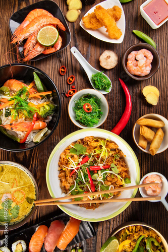 Asian food table with various kind of chinese food
