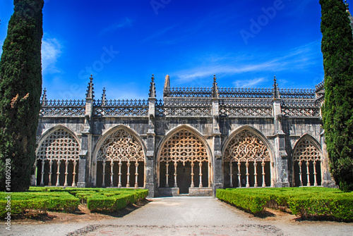 Fotografie View of gothic medieval Batalha Monastery and ornamental garden, Portugal