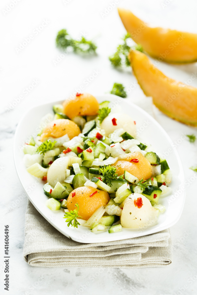 Melon salad with celery, chili and cucumber