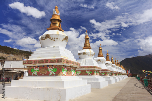 Row of stupas at the gate of Deqing city, Yunnan, China photo
