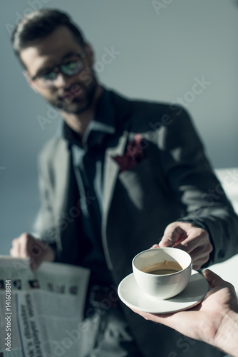 Handsome man with newspaper