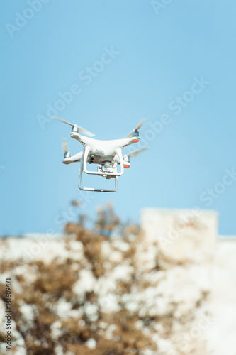 Drone quad copter in the sky photo