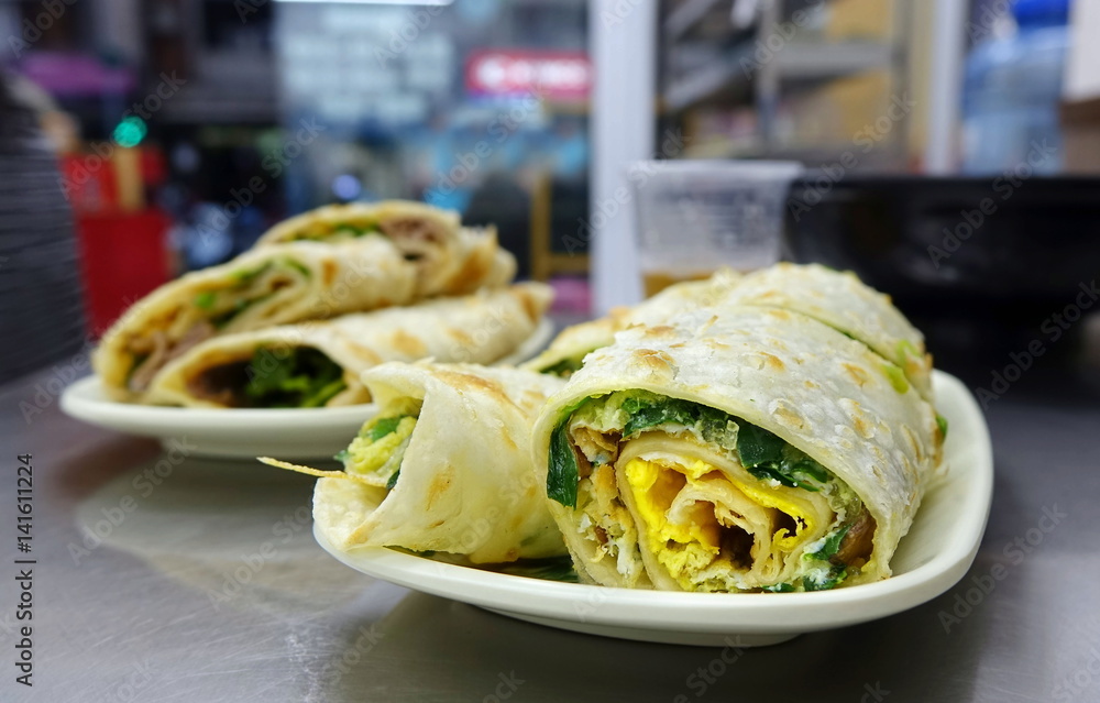Chinese Pancake Roll with Chives and Egg foto de Stock Adobe Stock