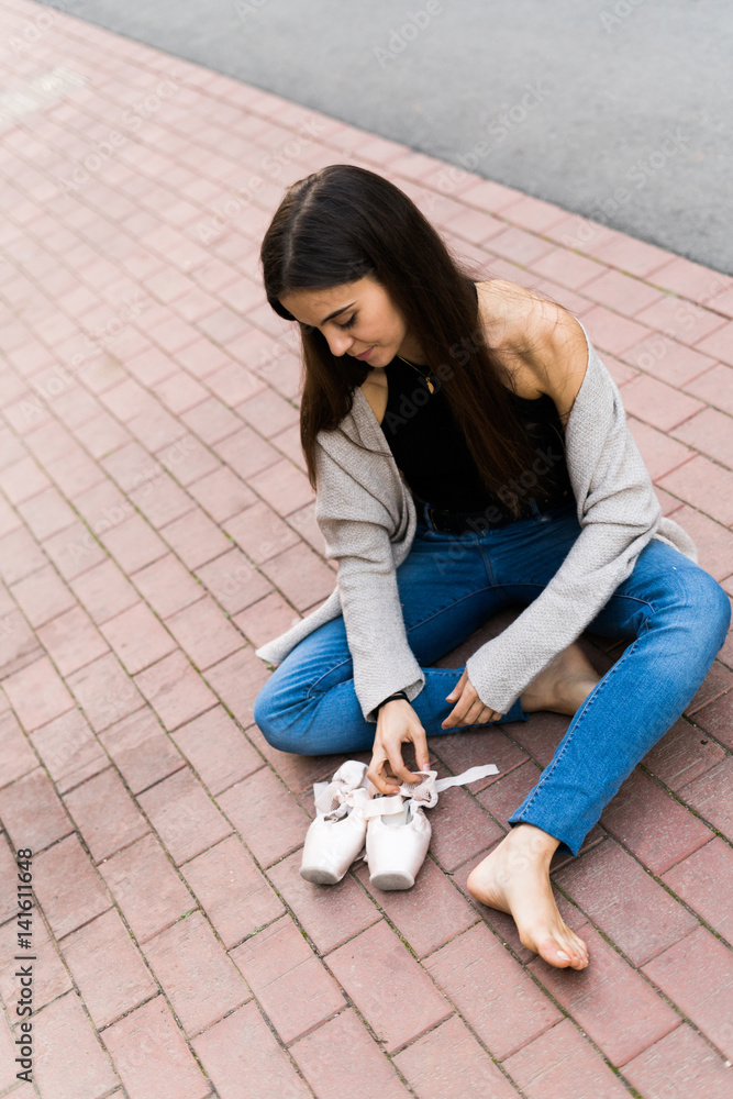 Girl with pointe�on the ground Girl with pointe�on the ground