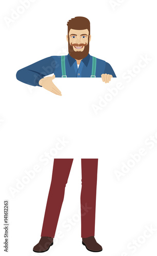 Hipster showing blank signboard