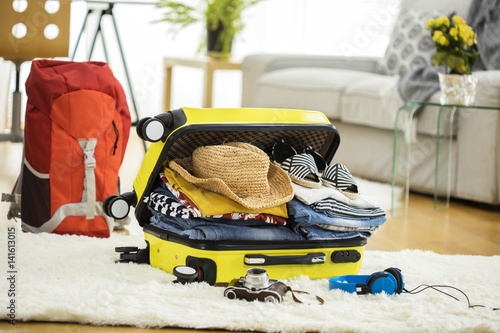 Preparation travel suitcase at home