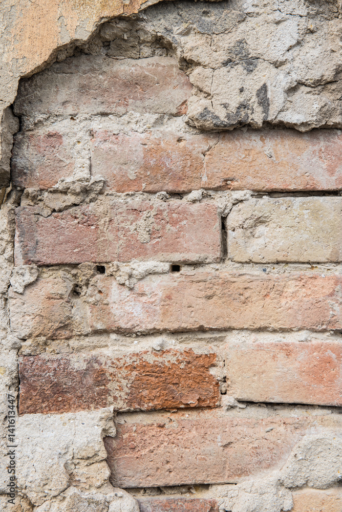 Cracked paint old brick background Cracked paint old brick background