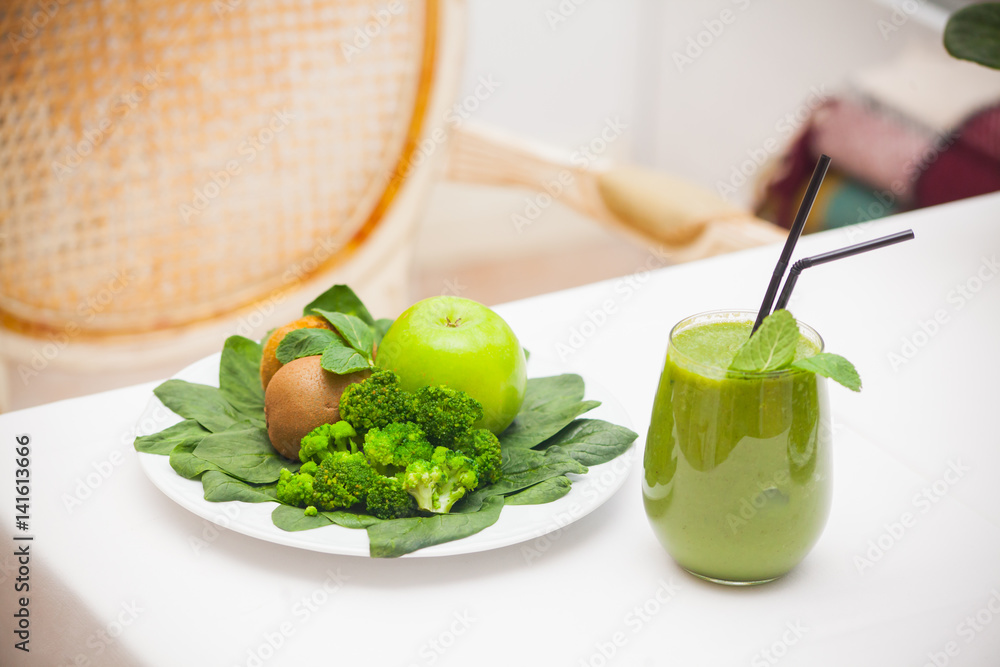 Healthy green smoothie and ingredients - superfoods, detox, diet, health, vegetarian food concept. Healthy green smoothie and ingredients - superfoods, detox, diet, health, vegetarian food concept.