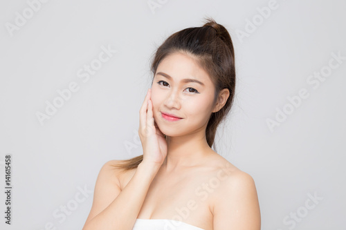 Asian beautiful women touching on her cheek
