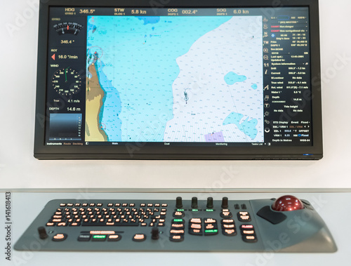 Navigational panel on a boat. Сoastline map on a screen of a navigator on a commercial shipping vessel.