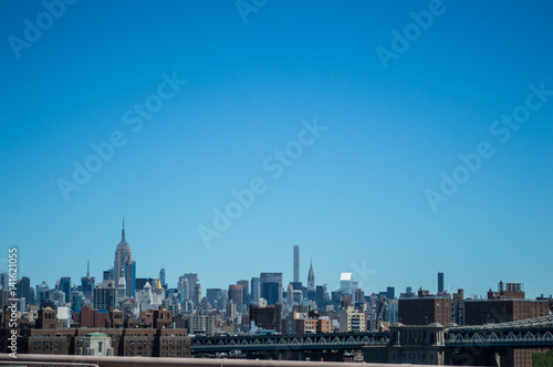 Skyline of Midtown Manhattan as Seen from Brooklyn Bridge, USA © MilesAstray