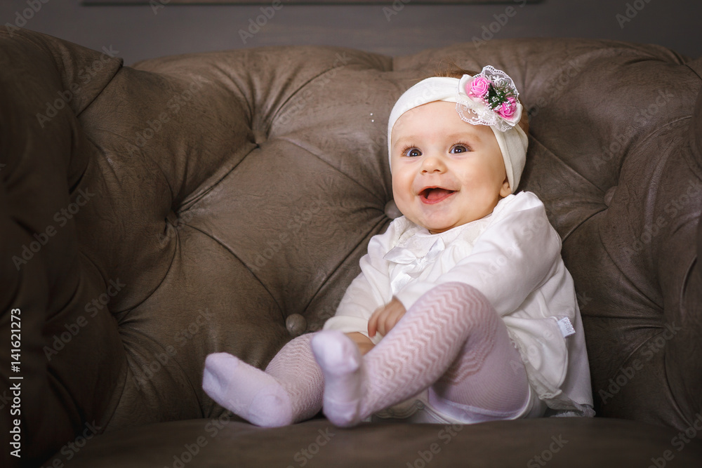 surprised kid sitting at table. child's eyes widened and mouth opened surprised kid sitting at table. child's eyes widened and mouth opened