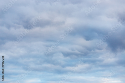 Background and texture. Evening cloudy clouds in abundance