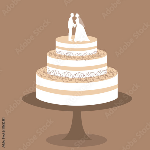 Wedding cake with bride and groom figurine.