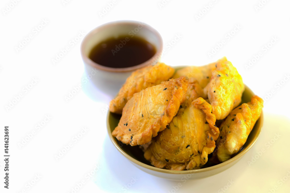 Curry puff pastry on white background Curry puff pastry on white background