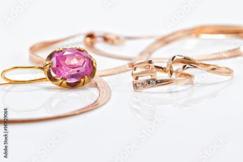 Gold earrings and rings from different sets