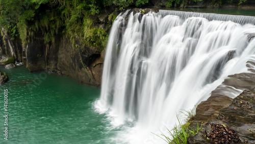 Fototapeta Naklejka Na Ścianę i Meble -  Long Exposure of beautiful Waterfall at Shifen Waterfall in Pingxi District, New Taipei City, Taiwan