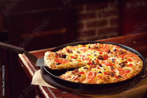 Pizza, slice, ready to serve