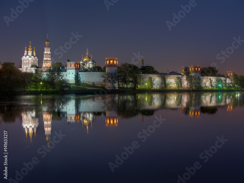 Moscow monastery Novodevichy Convent at night  with reflection in the pond