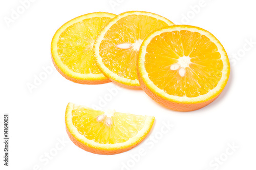Cut orange on white background close up