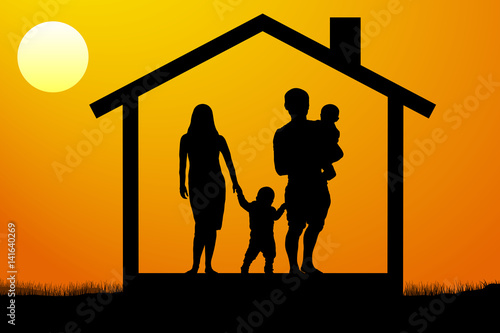 a young family with children in the house at sunset