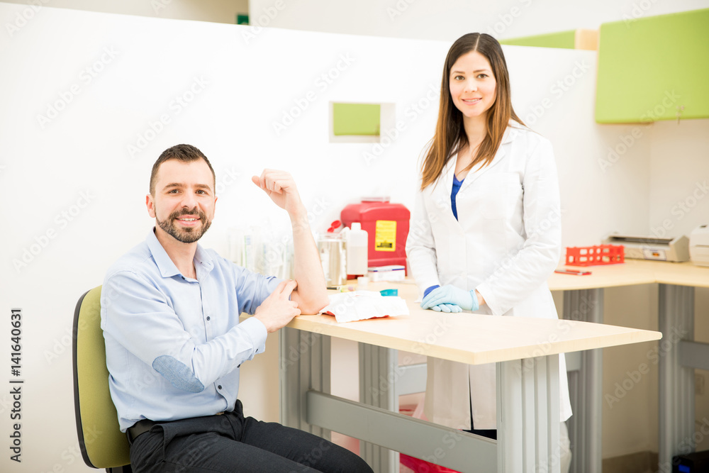 Patient and doctor after drawing some blood Patient and doctor after drawing some blood