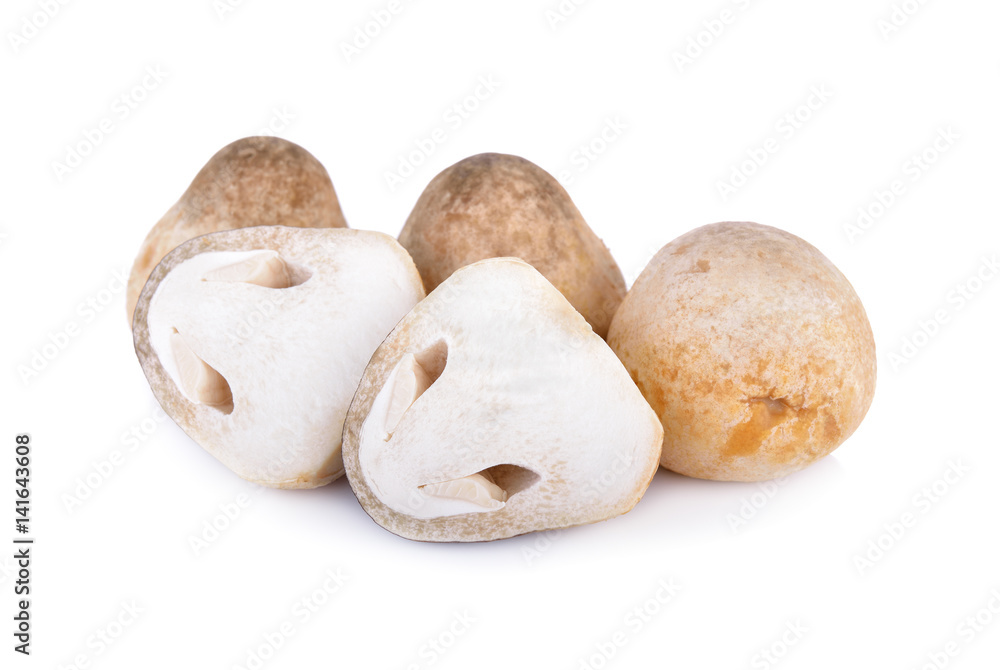 whole and half cut raw mushroom on white background whole and half cut raw mushroom on white background