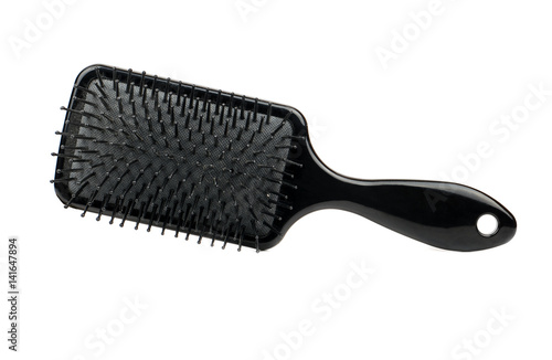 Photos Black plastic hairbrush isolated on white background