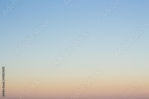 Natural background of sky color sunset. © amornchaijj