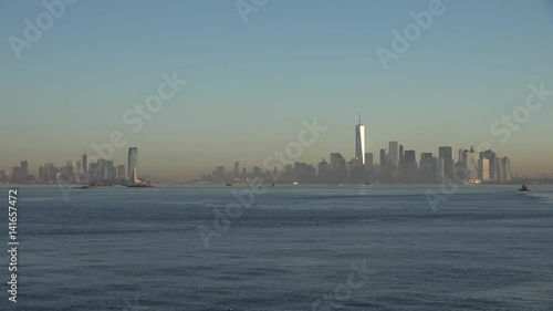 Golden sunset Manhattan Downtown panorama skyscrapers, New York City NYC Skyline. Apartments Buildings. The skyline of New York City at Sunset filmed from the the New Jersey.