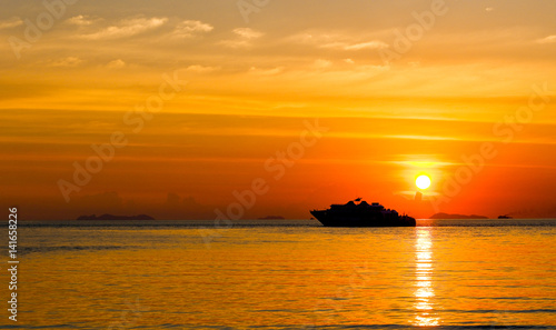 Ferry transportation with golden sunrise sunset in Koh Samui Thailand