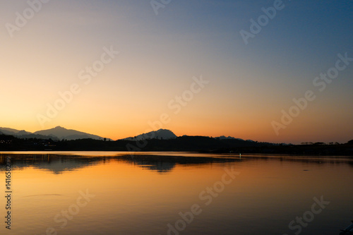 Sunrise Sunset with mountain reflect on river