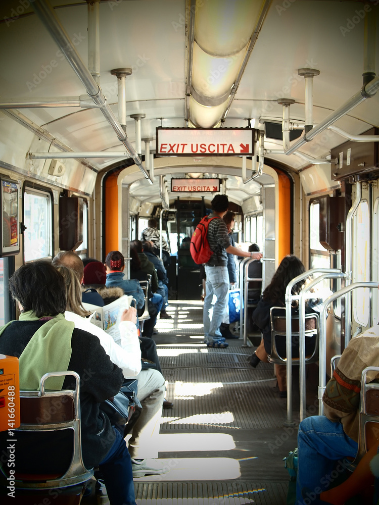 People travelling inside a tram