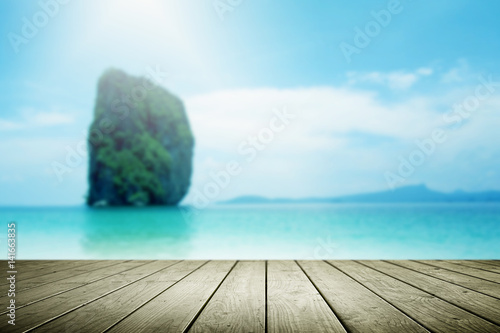 Beautiful blurred beach background and empty wooden.