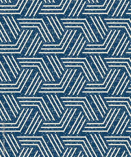 Abstract seamless pattern of a plurality of triangles and stripes. Textured background.