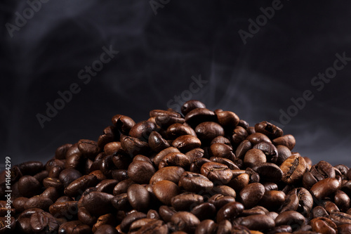 roasted coffee beans with smoke