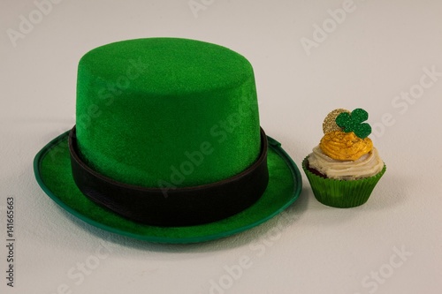 St Patrick's Day leprechaun hat with shamrock on cupcake