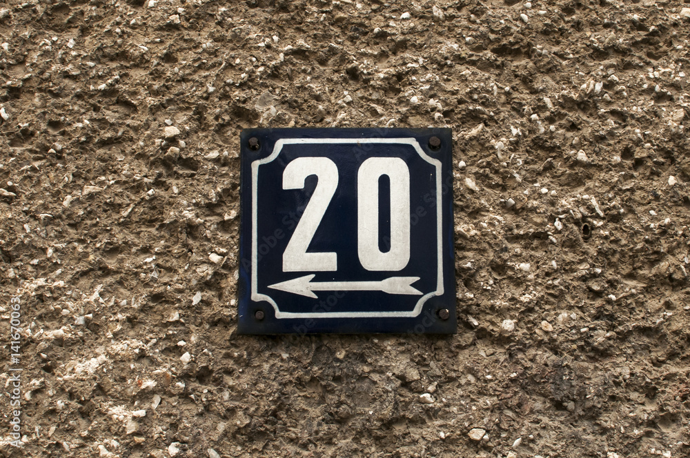 Weathered grunge square metal enameled plate of number of street address with number 20 closeup Weathered grunge square metal enameled plate of number of street address with number 20 closeup
