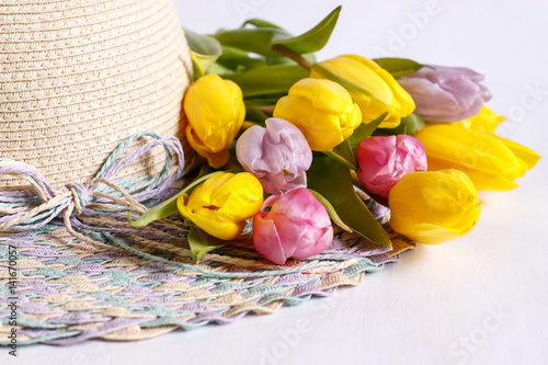 Women's hats with a bouquet of tulips
