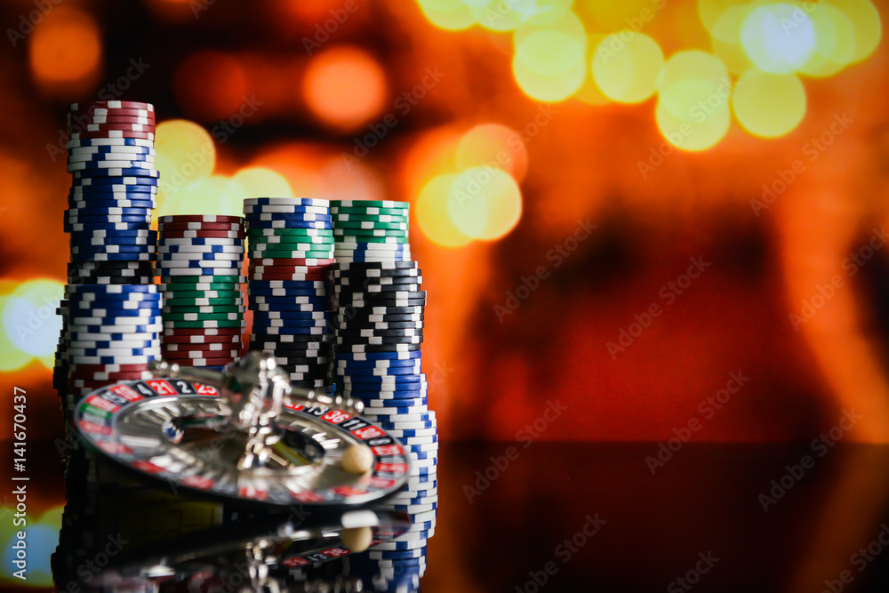Casino Concept background with dice, golden coins, cards, roulette and chips. Casino Concept background with dice, golden coins, cards, roulette and chips.
