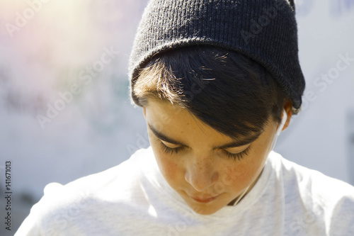 portrait of thoughtful crestfallen child